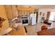 View of the kitchen showing cabinets, sink, countertops, and stainless steel appliances at 2448 45Th S St, St Petersburg, FL 33711