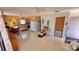 Open concept living space with view of kitchen and access to a large window at 2448 45Th S St, St Petersburg, FL 33711