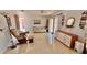 Living space with tiled floors, area rug, sliding glass door and furniture at 2448 45Th S St, St Petersburg, FL 33711