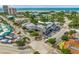 An aerial view of a vibrant shopping area near the beach with cars and people at 2537 Ashton Rd, Sarasota, FL 34231
