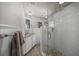 Elegant bathroom with a glass-enclosed shower, modern fixtures, and decorative accents at 2537 Ashton Rd, Sarasota, FL 34231