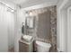 Unique bathroom design with stone wall, modern fixtures, and walk-in shower at 2537 Ashton Rd, Sarasota, FL 34231