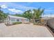 A charming home featuring a well-paved driveway and a delightful yard with lush greenery at 2537 Ashton Rd, Sarasota, FL 34231
