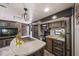Well-equipped kitchen with an island, stainless steel appliances, and an open layout for easy entertaining at 2537 Ashton Rd, Sarasota, FL 34231