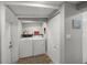 Laundry room with washer, dryer, and storage space at 2537 Ashton Rd, Sarasota, FL 34231