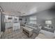 Inviting living room with ample seating, a stylish kitchen area, and plenty of natural light for a cozy atmosphere at 2537 Ashton Rd, Sarasota, FL 34231
