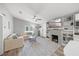Bright living room with fireplace, built-ins, and comfortable seating arrangement at 2537 Ashton Rd, Sarasota, FL 34231