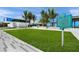 Picturesque public beach with palm trees, grassy area, and modern architecture at 2537 Ashton Rd, Sarasota, FL 34231