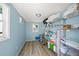 A well-lit storage room with ample shelving and space, perfect for organized storage solutions at 2537 Ashton Rd, Sarasota, FL 34231