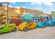A Tiki Bar with novelty vehicles for rent, including covered buggies and bikes at 2537 Ashton Rd, Sarasota, FL 34231
