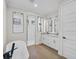 Elegant bathroom with double sinks, soaking tub, and walk-in shower at 260 Marker Rd, Rotonda West, FL 33947