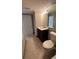 The remodeled bathroom has a modern vanity and sleek tiled shower at 2763 Woodgate Ln # 210, Sarasota, FL 34231