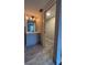 A modern bathroom with updated vanity and tile floors at 2763 Woodgate Ln # 210, Sarasota, FL 34231