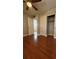 The bedroom boasts wood floors and closet space for optimal storage at 2763 Woodgate Ln # 210, Sarasota, FL 34231
