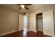 The bedroom boasts wood floors and closet space for optimal storage at 2763 Woodgate Ln # 210, Sarasota, FL 34231