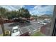 View of the parking lot from the building at 2763 Woodgate Ln # 210, Sarasota, FL 34231