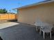 Concrete patio area with a table and chairs, perfect for outdoor dining at 2802 Jamaica St, Sarasota, FL 34231