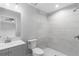Modern bathroom with walk-in shower, new fixtures, and contemporary design at 343 Tenk St, Port Charlotte, FL 33953