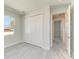 Bedroom featuring a closet, window, stylish flooring, and a view to the other rooms at 380 Holly Rd, Venice, FL 34293