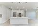Stylish kitchen boasts a center island, stainless steel appliances, and pendant lighting at 380 Holly Rd, Venice, FL 34293