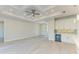 Bright, open space with a decorative ceiling, and a modern beverage cooler built into the white cabinets at 380 Holly Rd, Venice, FL 34293