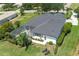 Aerial view of expansive lot featuring an inground pool, manicured lawn, and lounge chairs at 3806 155Th E Ave, Parrish, FL 34219