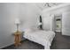 Bright bedroom with large window, soft carpet, and tray ceiling at 3806 155Th E Ave, Parrish, FL 34219