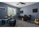 Bedroom featuring a ceiling fan, natural light and music equipment for a creative space at 3806 155Th E Ave, Parrish, FL 34219