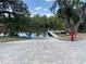 Community boat ramp on a sunny day with access to a tranquil waterway at 3806 155Th E Ave, Parrish, FL 34219