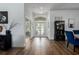Entryway showcasing wood floors, high ceilings, and an open floor plan at 3806 155Th E Ave, Parrish, FL 34219