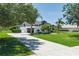 Beautiful home featuring manicured landscaping, concrete driveway and two-car garage at 3806 155Th E Ave, Parrish, FL 34219