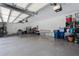 Spacious two-car garage with ample storage space and organization systems at 3806 155Th E Ave, Parrish, FL 34219