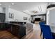 Open concept living space with a view of the kitchen and dining area, perfect for entertaining at 3806 155Th E Ave, Parrish, FL 34219