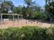 Community playground with swings, climbing structures, and safety surfacing at 3806 155Th E Ave, Parrish, FL 34219