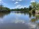Peaceful view of the tranquil waterway with lush vegetation along the banks at 3806 155Th E Ave, Parrish, FL 34219