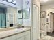 Bathroom with vanity, mirror, toilet, and linen closet at 4122 Central Sarasota Pkwy # 1923, Sarasota, FL 34238