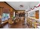 Spacious clubhouse featuring a seating area, bar, and large windows with a view of the patio at 4122 Central Sarasota Pkwy # 1923, Sarasota, FL 34238