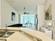 Open-concept living room and dining area with ample natural light and modern decor at 4122 Central Sarasota Pkwy # 1923, Sarasota, FL 34238