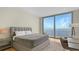 Cozy main bedroom featuring a comfortable bed and a relaxing view of the ocean at 4123 Bay Shore Rd, Sarasota, FL 34234