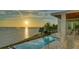 Enjoy stunning ocean views from this home with an infinity edge pool at 4123 Bay Shore Rd, Sarasota, FL 34234