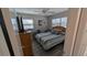 Bedroom featuring natural light and laminate flooring at 4158 Tamiami Trl # V1, Port Charlotte, FL 33952