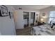 Bedroom with closet and shelving and laminate wood floors at 4158 Tamiami Trl # V1, Port Charlotte, FL 33952