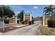 Welcome to Maria Manor, a well-maintained community with a classic brick entrance and beautiful landscaping at 4158 Tamiami Trl # V1, Port Charlotte, FL 33952