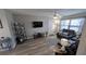 Inviting living room with wood floors, stylish furnishings, and plenty of natural light at 4158 Tamiami Trl # V1, Port Charlotte, FL 33952