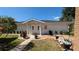 Charming community office with landscaped front yard and flowerbeds at 4158 Tamiami Trl # V1, Port Charlotte, FL 33952