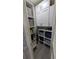 Convenient walk-in pantry offers ample storage space with built in storage, shelves and cabinets at 4158 Tamiami Trl # V1, Port Charlotte, FL 33952