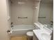 Bathroom featuring a bath tub, sink, and toilet at 425 30Th W Ave # C204, Bradenton, FL 34205