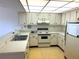 Functional kitchen with standard appliances and ample counter space at 425 30Th W Ave # C204, Bradenton, FL 34205