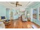 Open-concept floor plan featuring hardwood floors and a dining area next to the kitchen at 4519 14Th E St, Ellenton, FL 34222