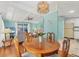 Open floor plan showing dining area flows into a bright living room with plenty of natural light at 4519 14Th E St, Ellenton, FL 34222
